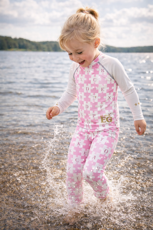 Cute and puzzled pink Kid's Leggings